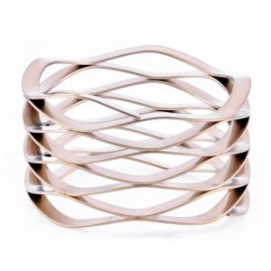 Resortes ondulados multivuelta sin extremos con cuñas